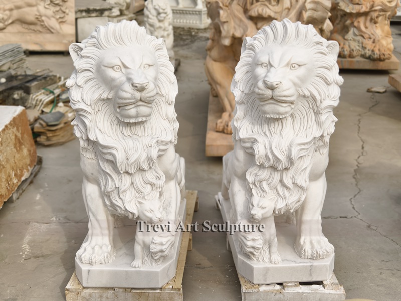 lion statue and cub