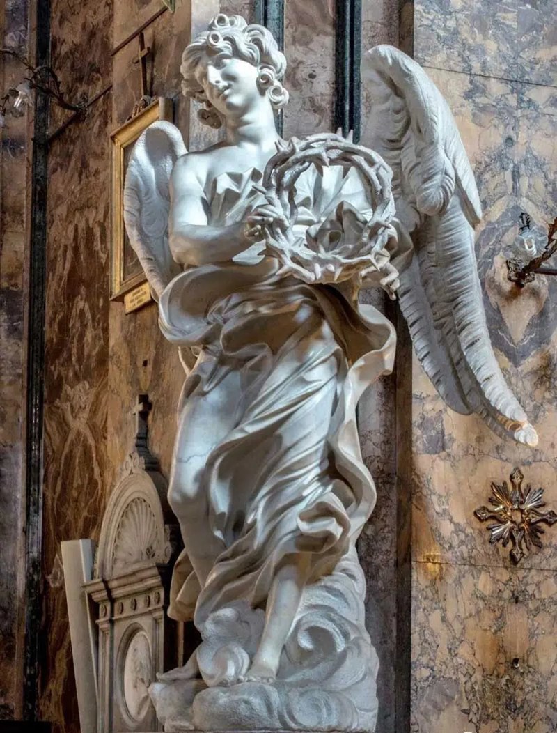 this is bernini’s original work, angel holding a crown of thorns