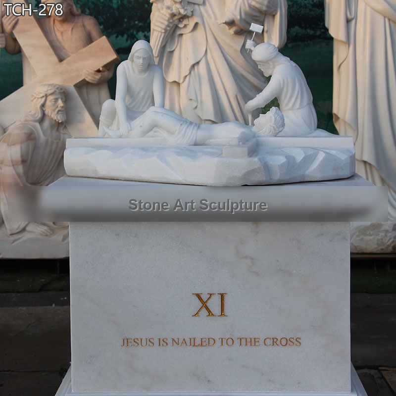 Station XI | Jesus Is Nailed To The Cross Marble Statue detail image