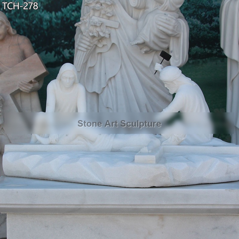 Station XI | Jesus Is Nailed To The Cross Marble Statue detail image