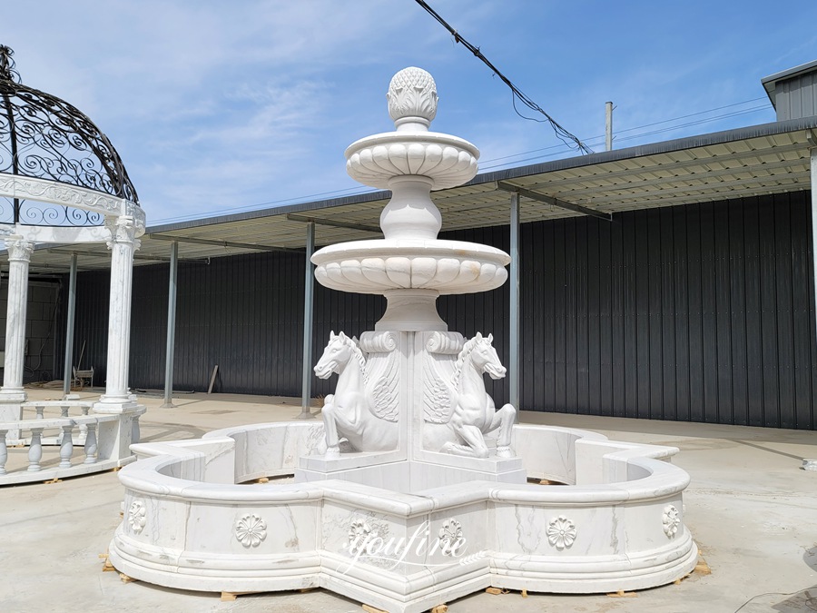white horse statue water fountain