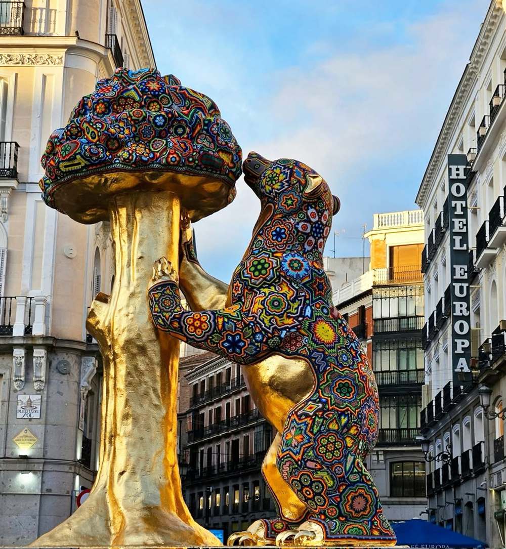 Custom colorful artistic bronze bear and strawberry tree sculpture