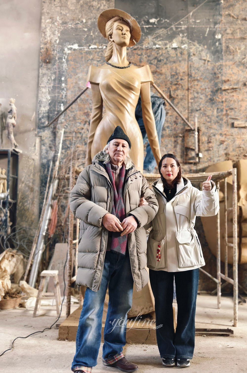 Our Sales Representative, Jane, the Artist Bolat Muhamediev, and the Completed Clay Model