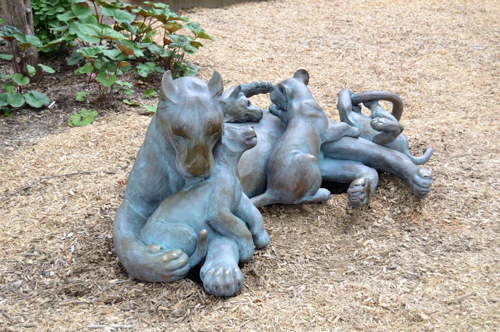 A family of wildlife lion sculptures for zoo decor