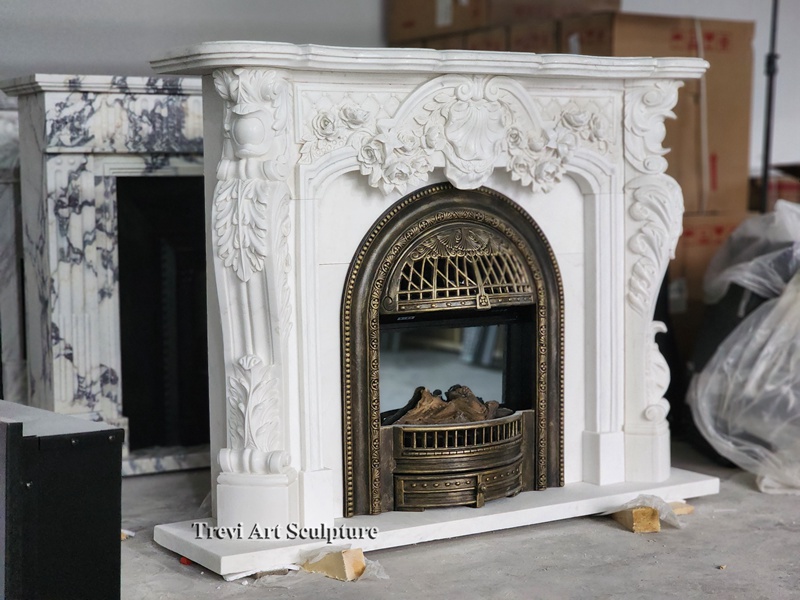 ornate hand carved marble fireplace