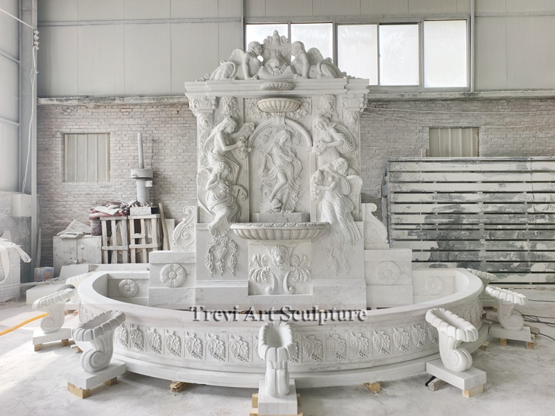 stone carved large wall fountain with relief
