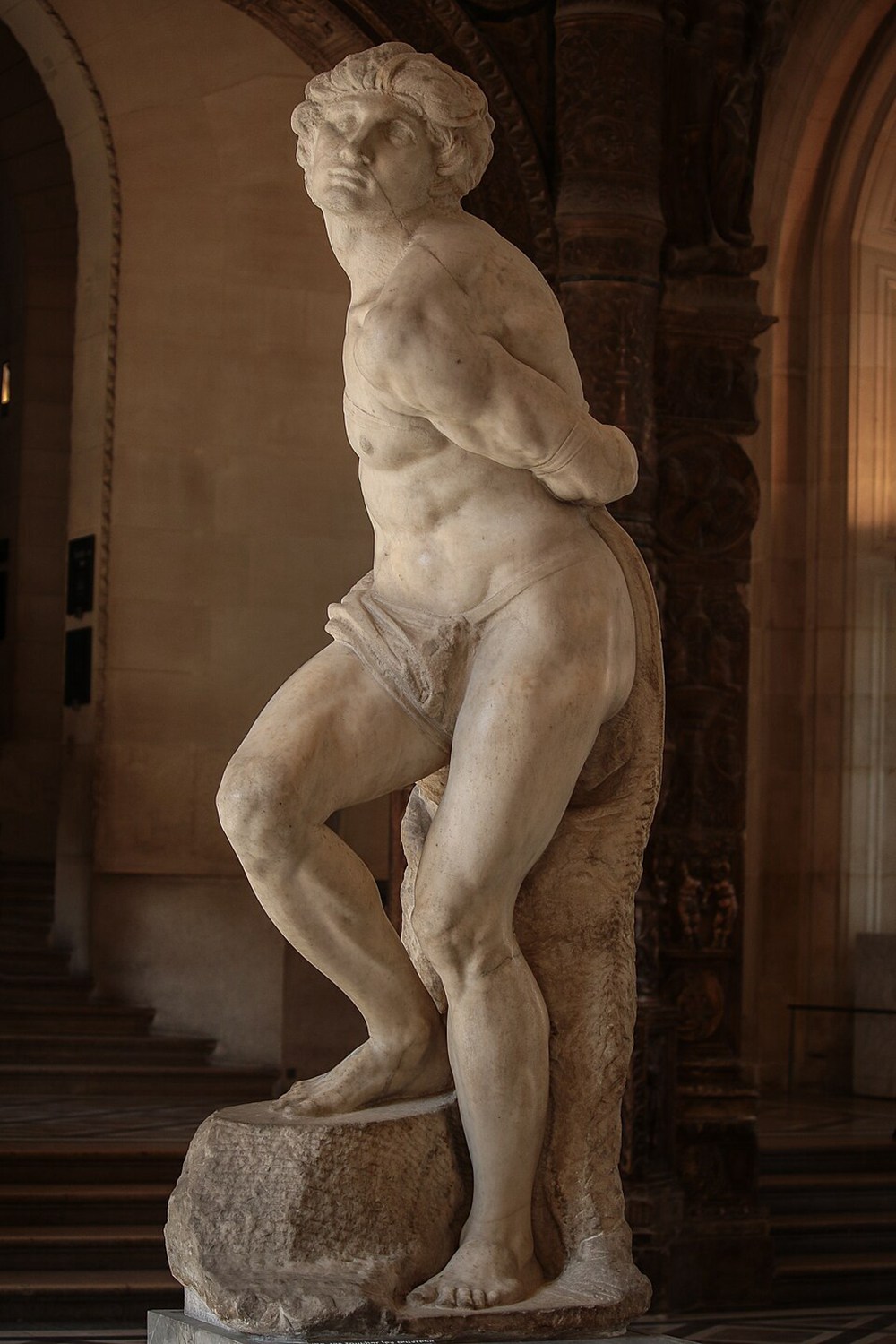 The Rebellious Slave is a 2.15m high marble statue by Michelangelo