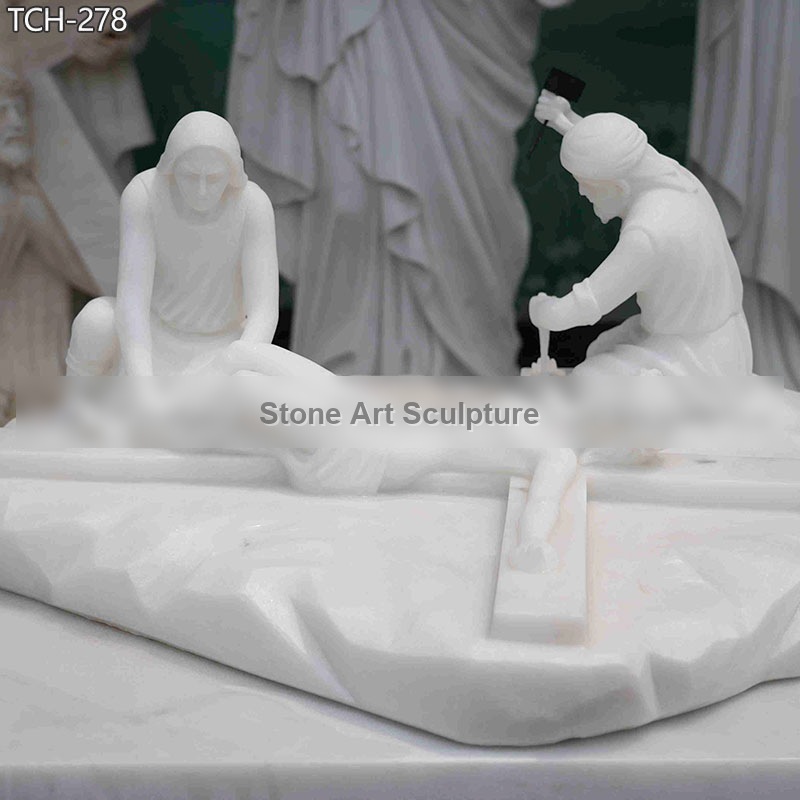 Station XI | Jesus Is Nailed To The Cross Marble Statue detail image