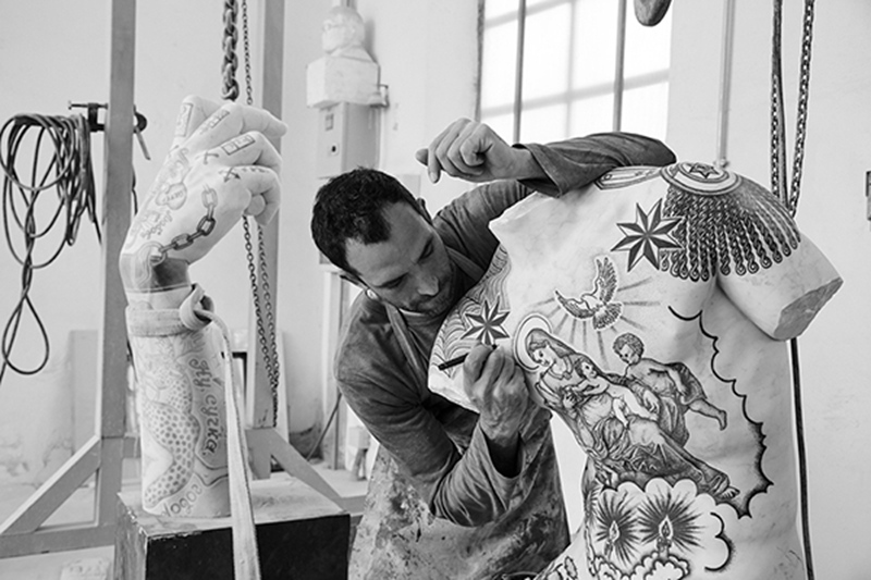 tattoed marble statue process