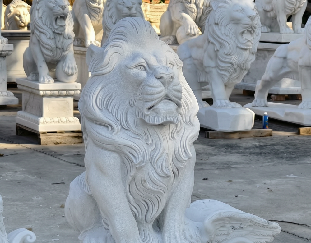 Pair of marble Sitting Lion Statues on Ball