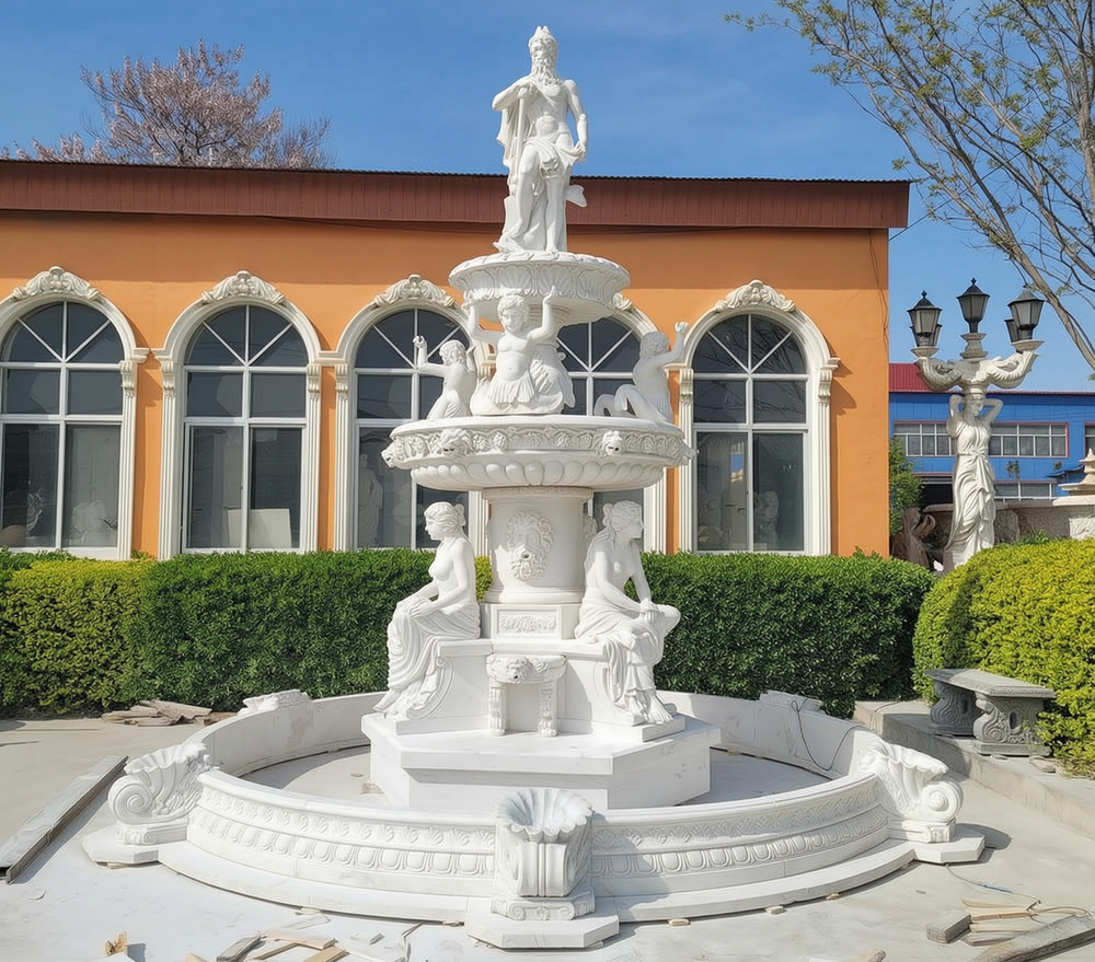 A fountain featuring a standing sea god and a seated woman