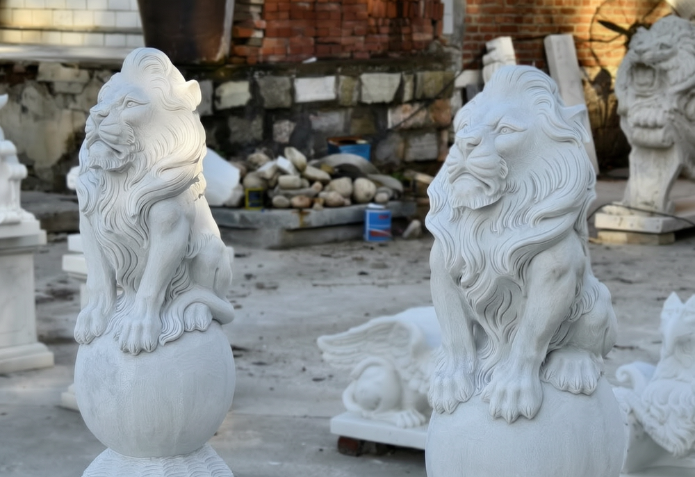 Pair of Sitting Lion Statues