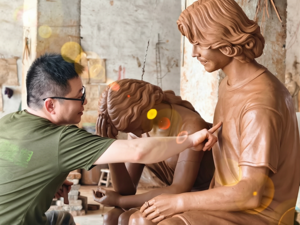 bronze sculpture made of The artist refining the details