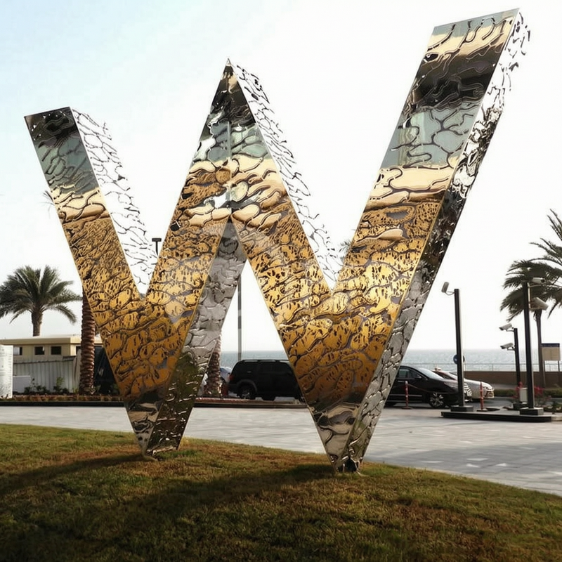 customized stainless steel “W” letter sculpture