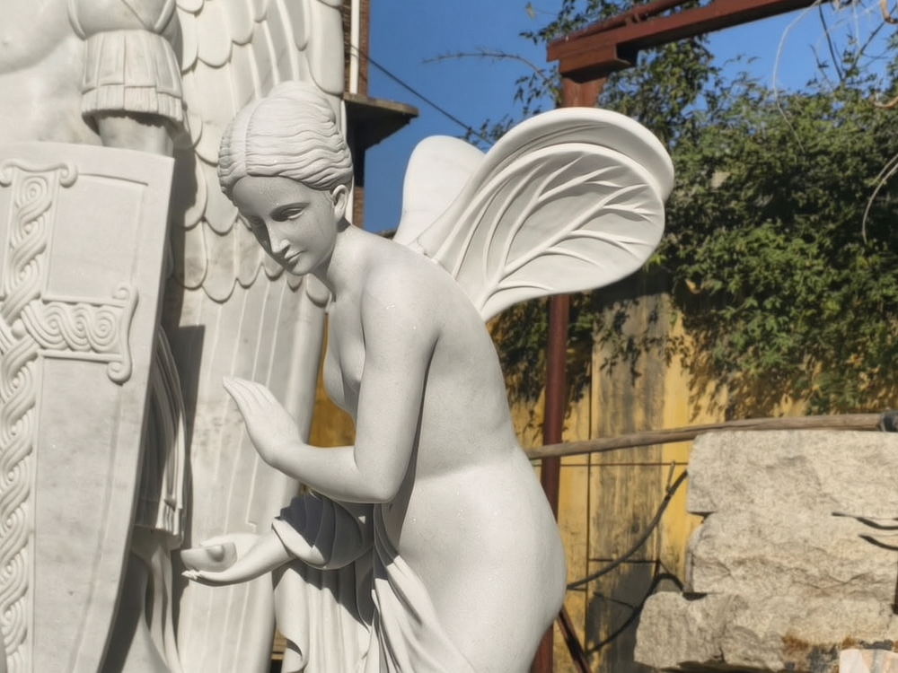 Sculpture of a Winged Flower Fairy