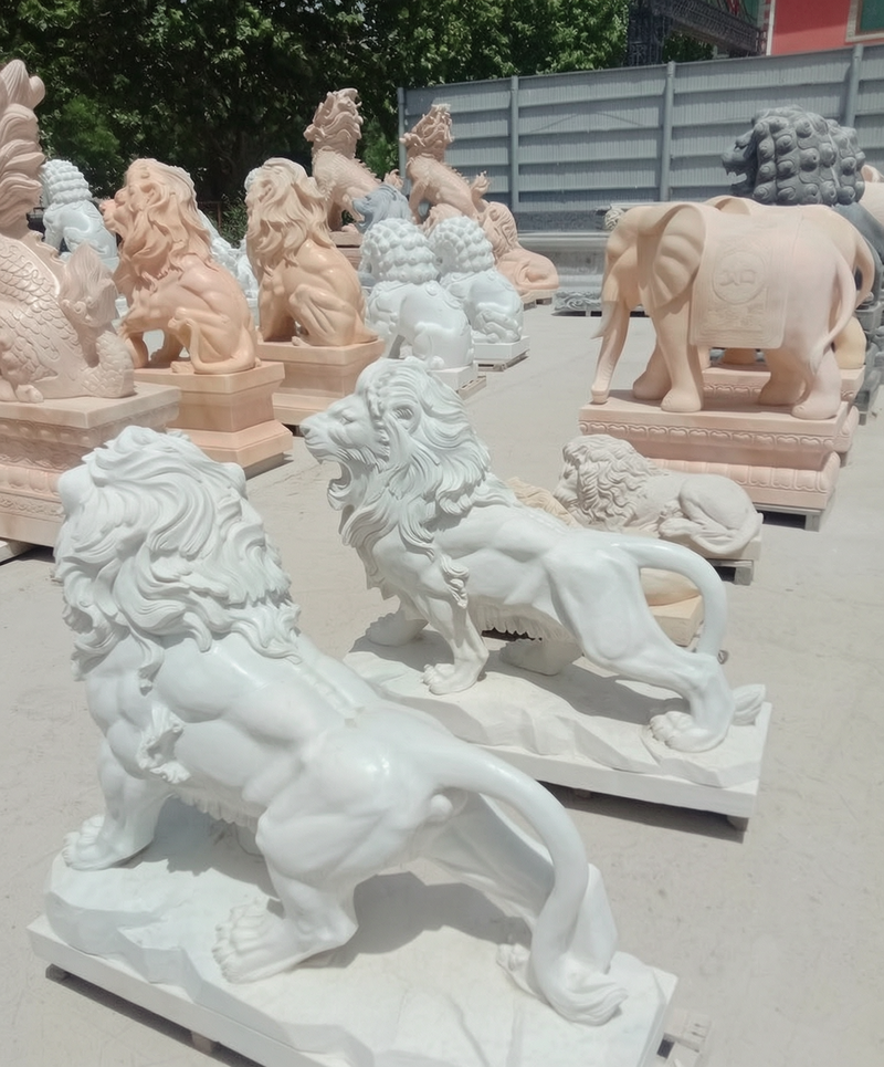 marble walking lion statues