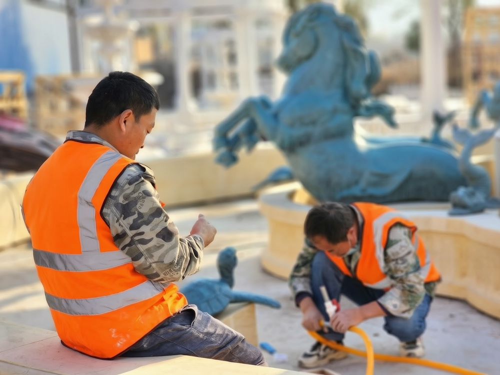 YouFine factory artisans working on large fountain