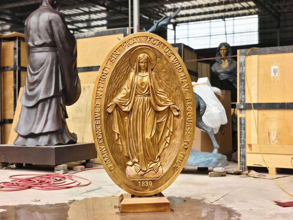 bronze virgin mary relief
