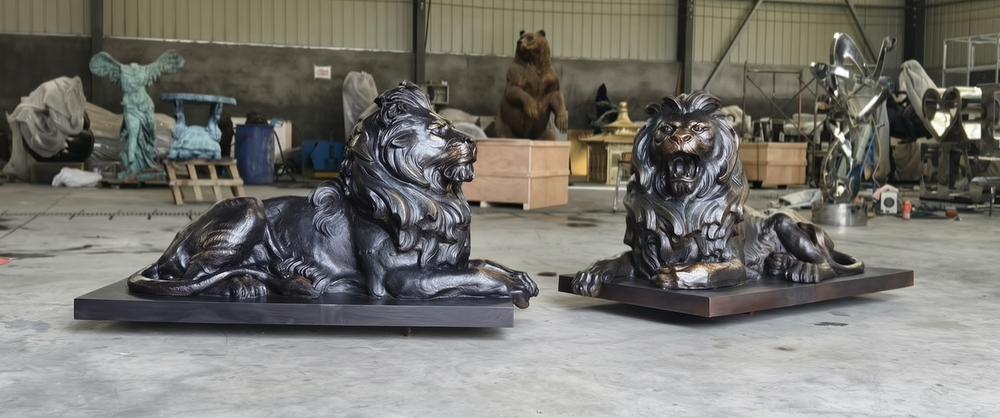 bronze lying lion statue
