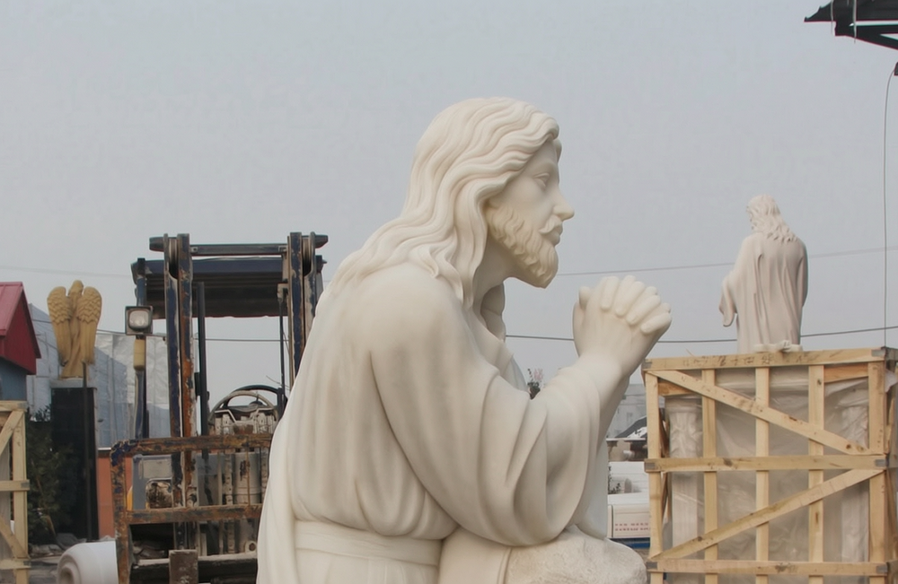 Kneeling in Prayer Jesus Statue details